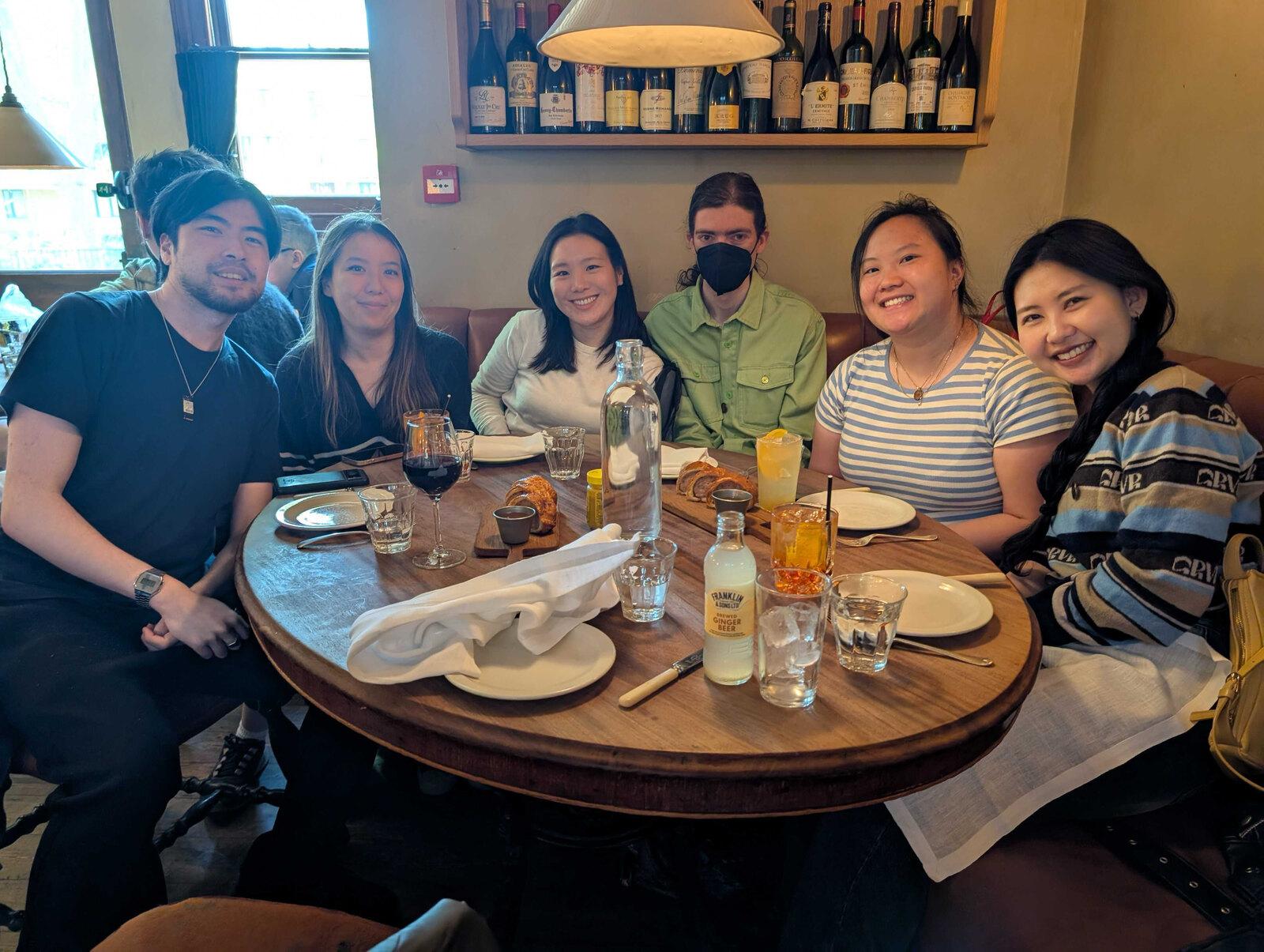 The team at dinner around a round table