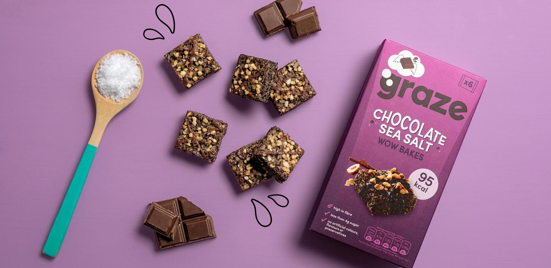 Graze chocolate sea salt snack bars arranged with chocolate pieces