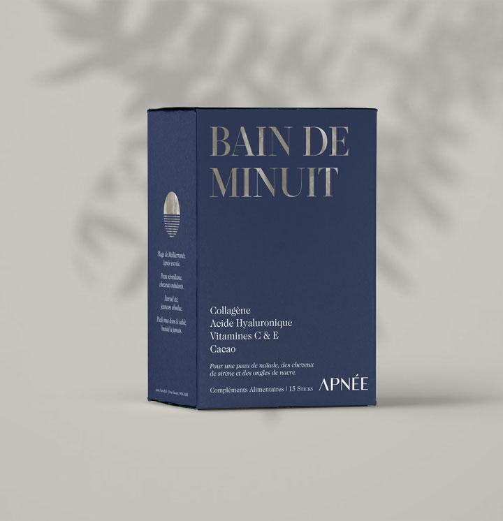 A box of Apnée Bain de Minuit supplements in soft shadow