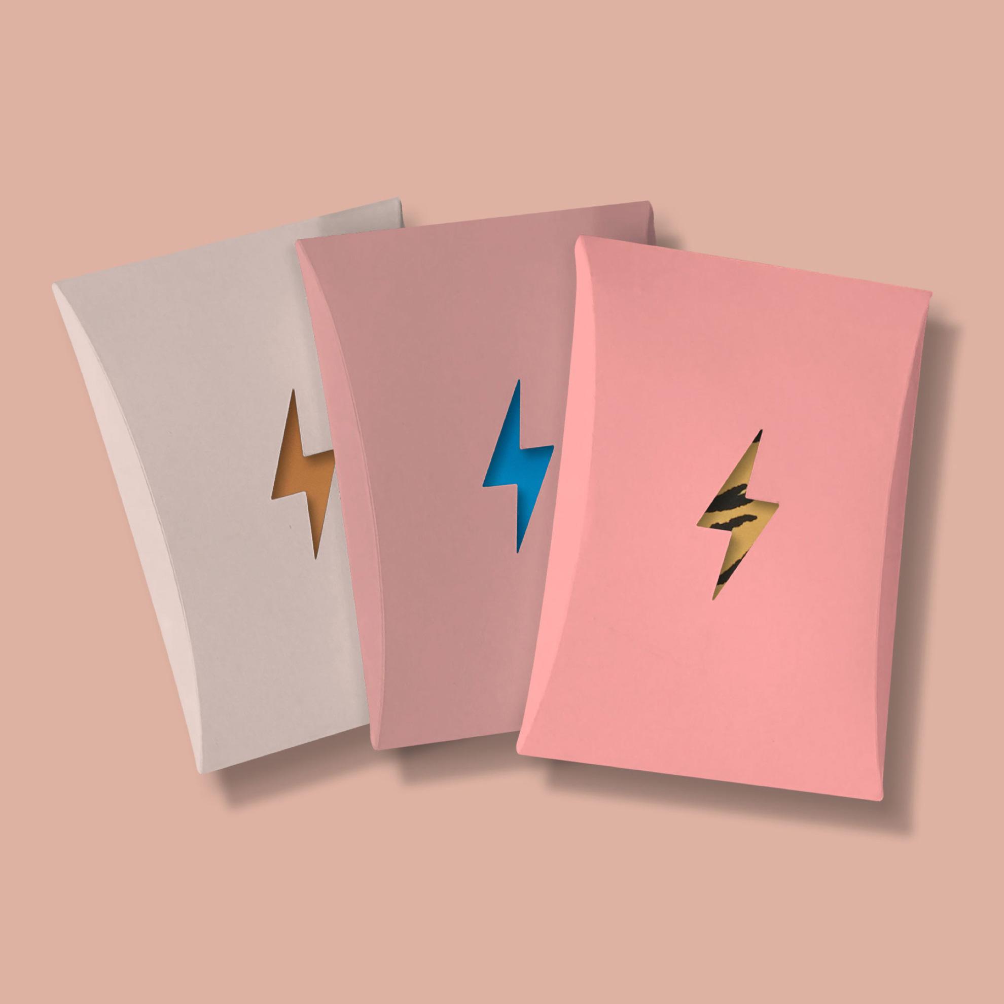 Three EBY subscription envelopes with lightning bolt cut-outs