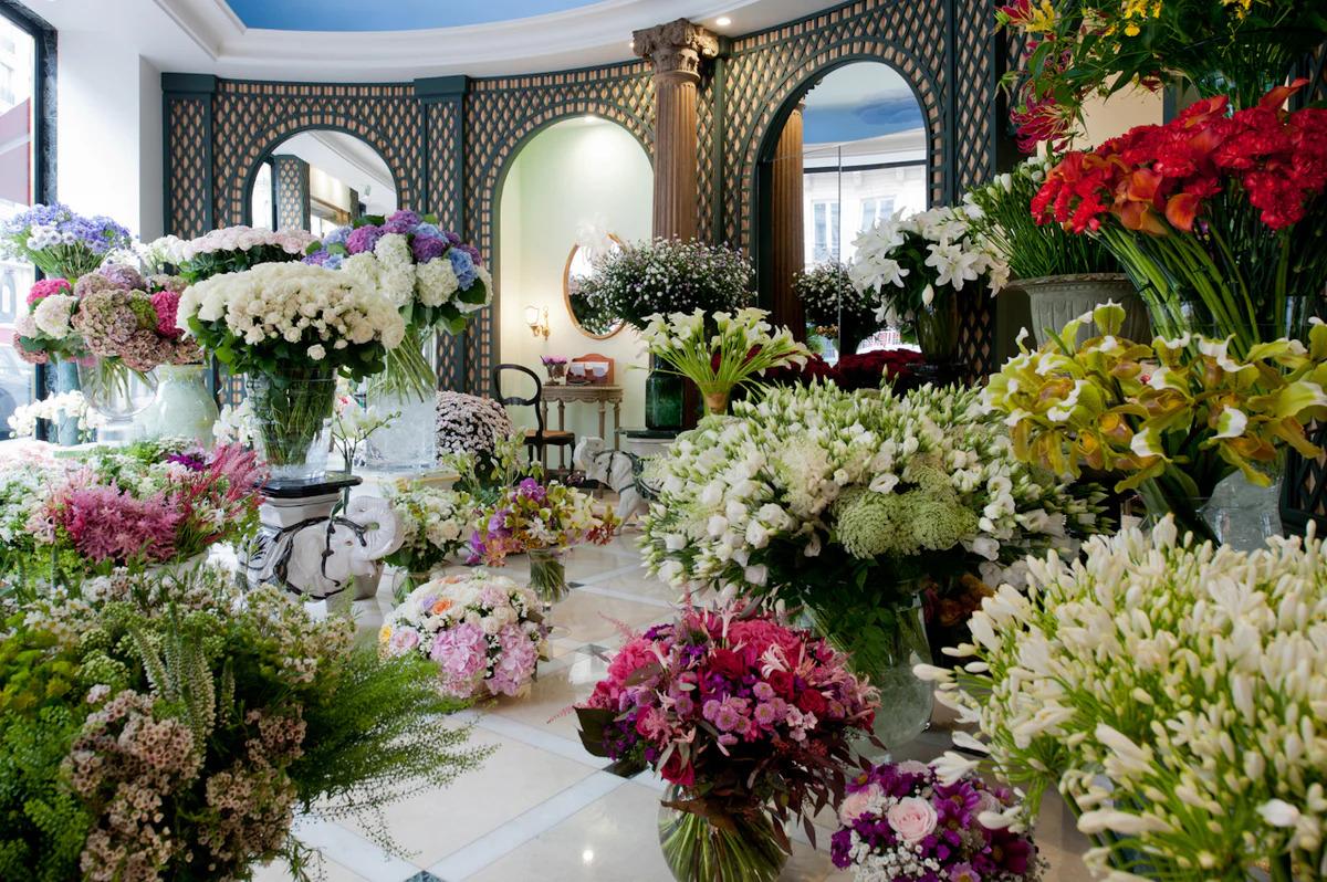 The inside of the Lachaume flower shop in Paris, filled with fresh flowers